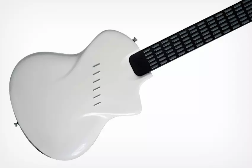 Poruszaj się po Guitar Hero, ta gitara elektryczna z kontrolerem MIDI nauczy Cię, jak niszczyć w prawdziwym życiu