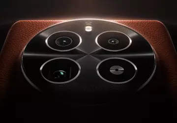 Duży, okrągły występ kamery i skórzany ...