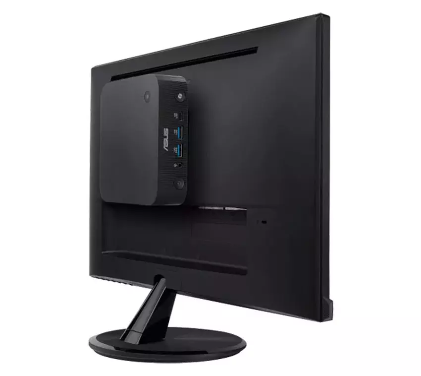 Zdjęcie Asus ExpertCenter PN55 Mini PC na tle biurka